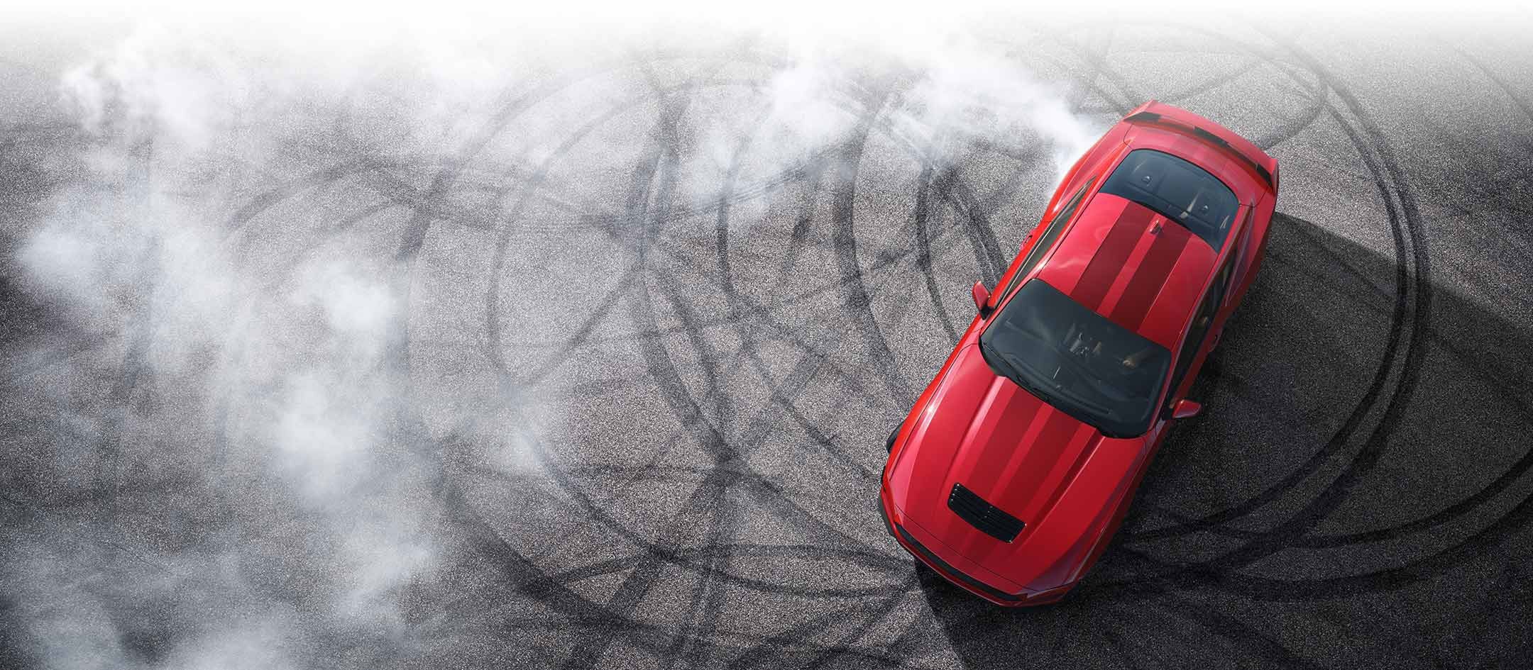 Overhead view of a 2024 Ford Mustang® model with tire tracks on pavement | Al Packer Ford West Palm Beach in West Palm Beach FL