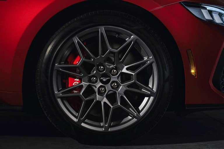 2024 Ford Mustang® model with a close-up of a wheel and brake caliper | Al Packer Ford West Palm Beach in West Palm Beach FL