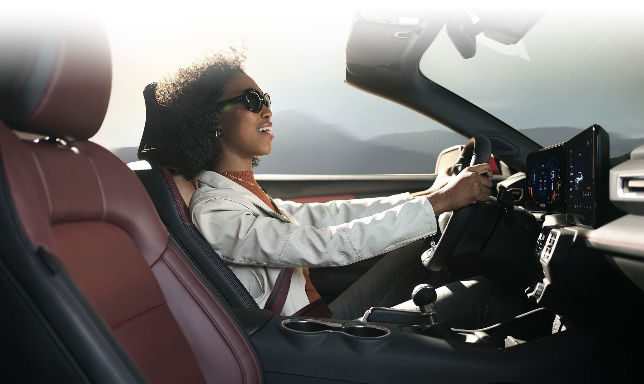 Person sitting in the driver’s seat of a 2024 Ford Mustang® convertible | Al Packer Ford West Palm Beach in West Palm Beach FL