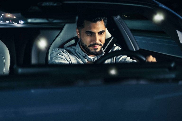 Person sitting in the driver’s seat of a parked 2024 Ford Mustang® coupe | Al Packer Ford West Palm Beach in West Palm Beach FL